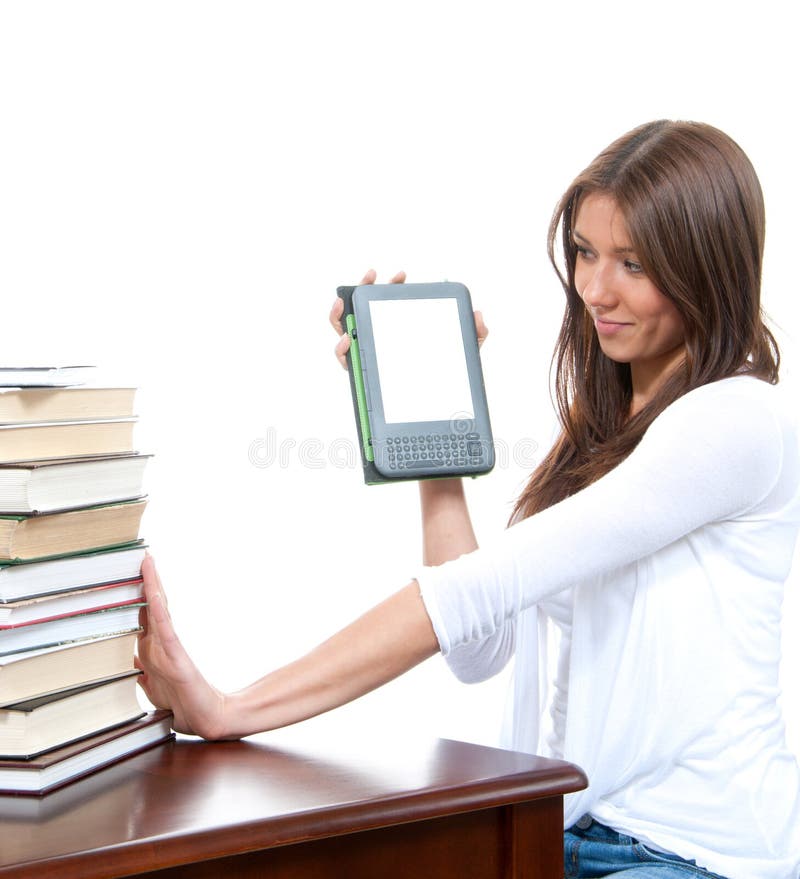 Woman compare books and new wireless reading digital ebook device stock photography Woman compare books and new wireless reading digital ebook device stock photography