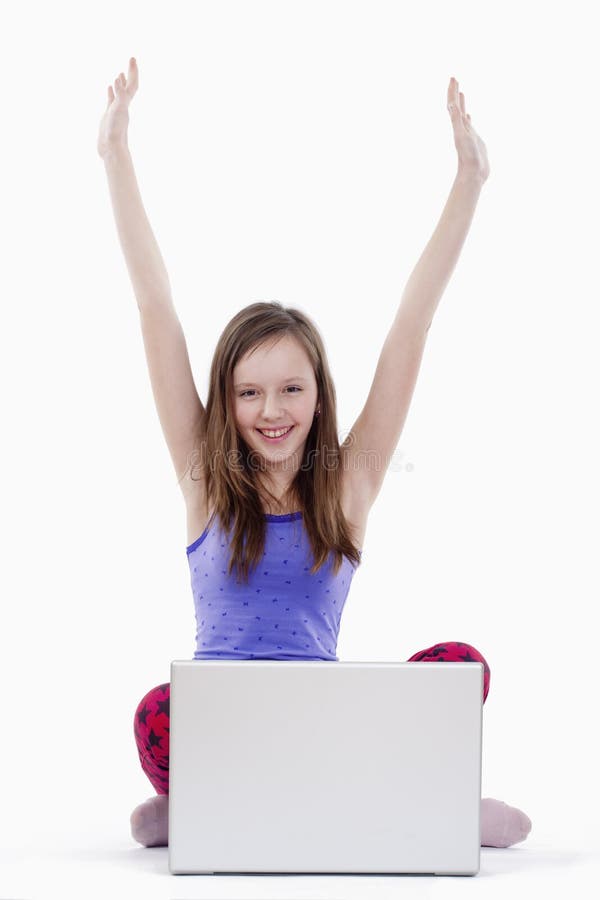 Woman with computer cheering