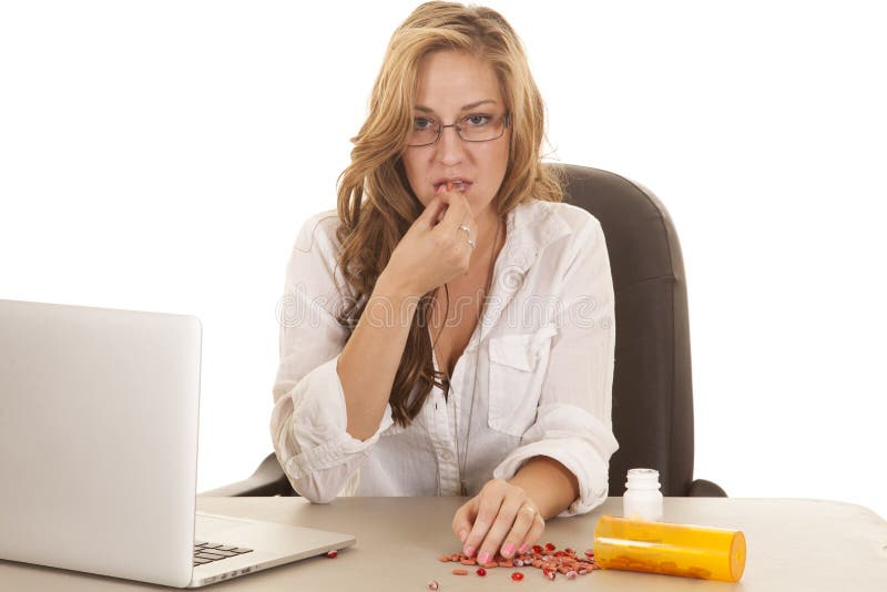 Woman computer taking pills