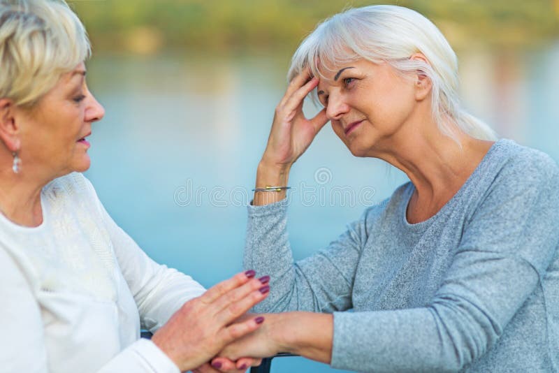 Woman Consoling Her Friend stock photography Woman Consoling Her Friend stock photography