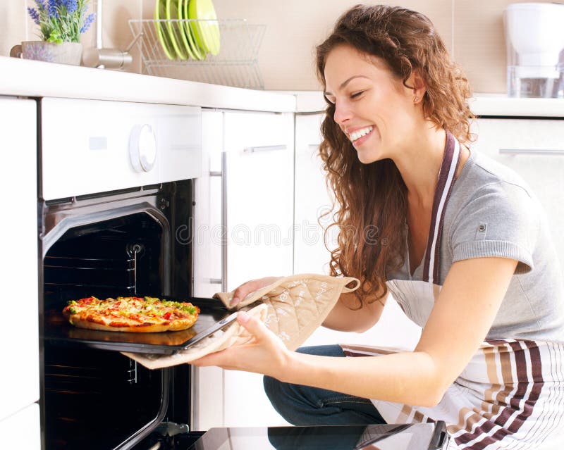 Woman Cooking Pizza