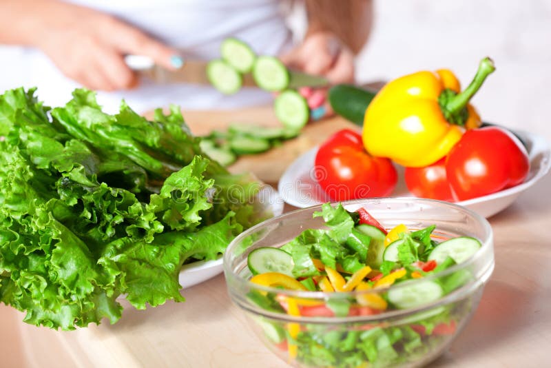 Woman cooking salad