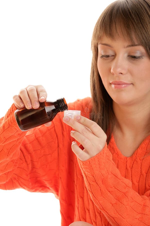 Woman with cough syrup stock photo. Image of illness 14134042