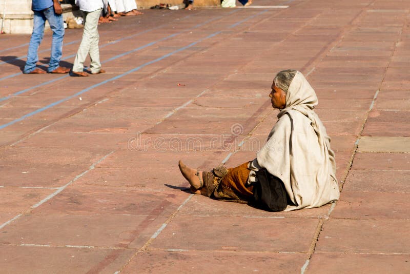Woman in Courtyard at the Great Mosque (Jama Masjid) in Delhi, India