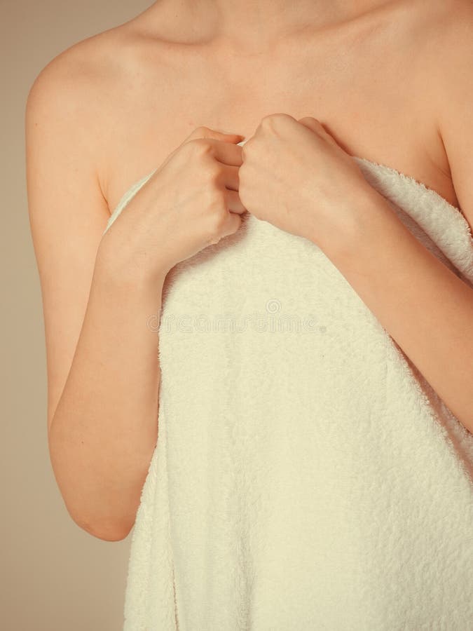 Woman Covering Breast Under Towel. Stock Photo - Image of innocence,  female: 108002566