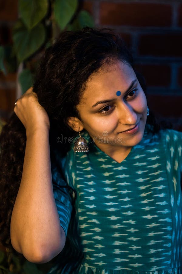 Woman with curly hairs stock photo. Image of elegance - 197399148