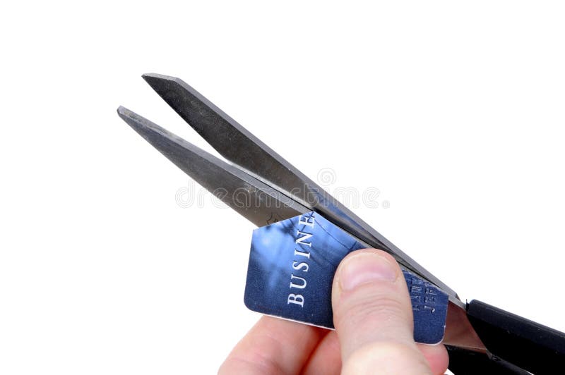 Woman cutting cut credit card