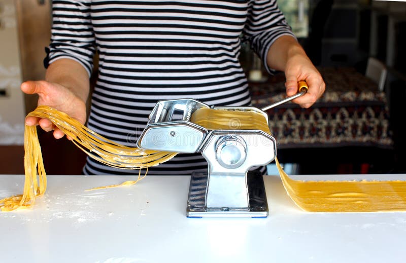 Woman Cutting Pasta Dough on the Machine at Home Stock Image Image of homemade, pasta 18596493