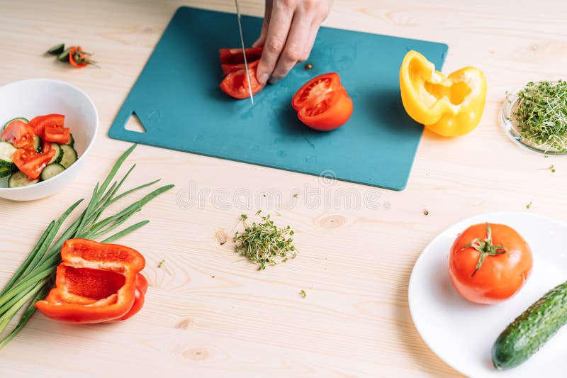 Woman Cutting Tomato for Vegetable Salad Stock Image Image of lunch