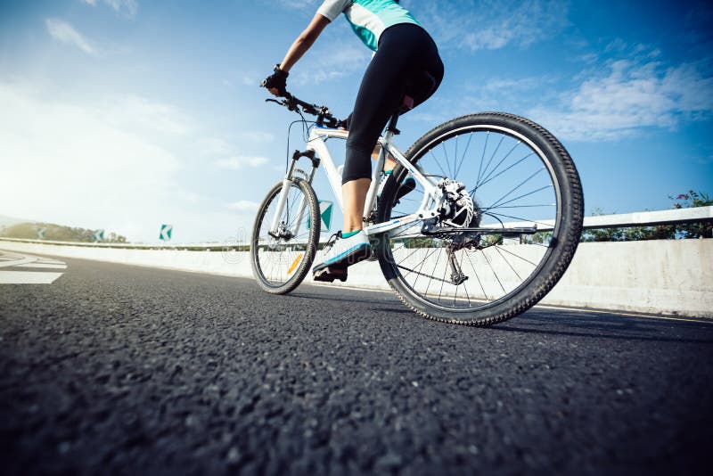 Cyclist Riding Mountain Bike on Highway Stock Image - Image of bicycle ...
