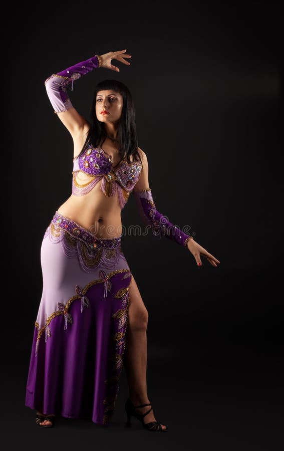 Woman dance in traditional arabian costume