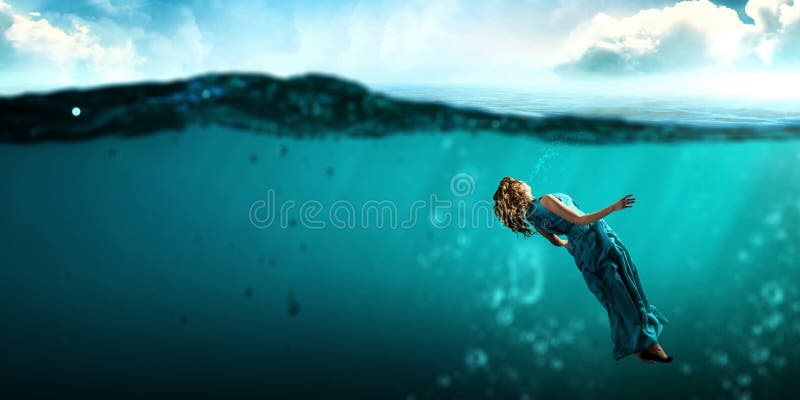 Woman dancer in clear blue water stock photography Woman dancer in clear blue water stock photography
