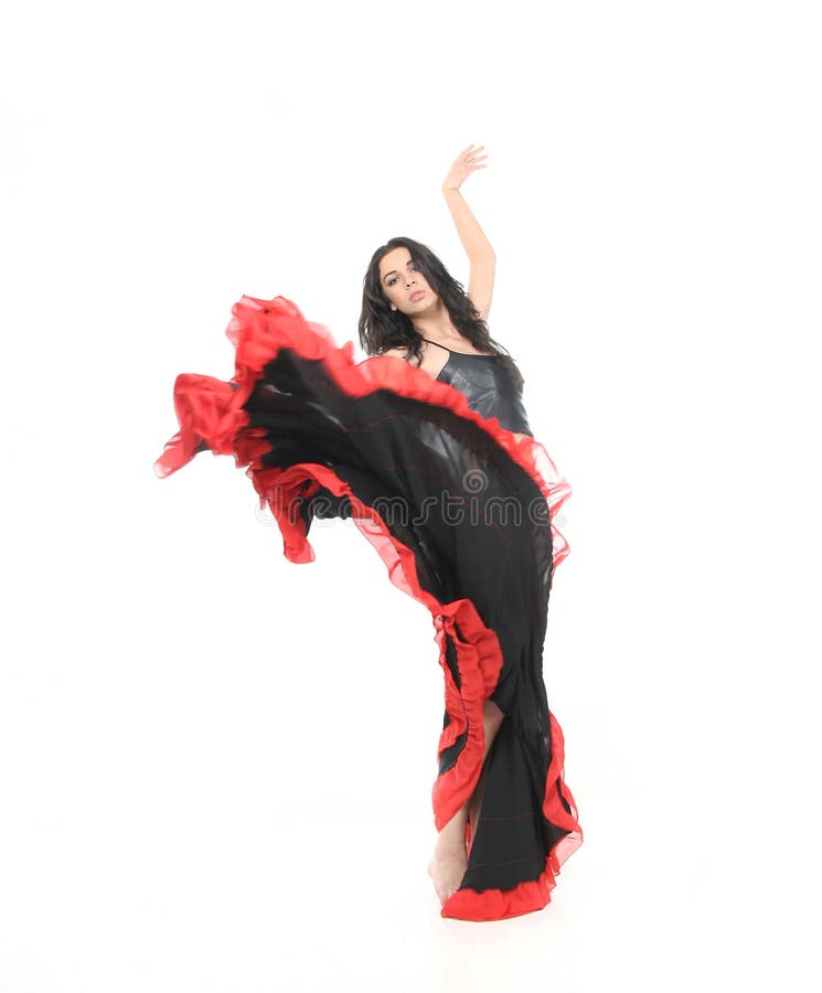 Woman dancing flamenco over white