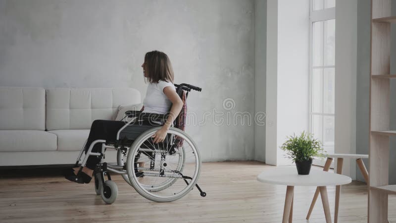 Woman dancing on wheelchair