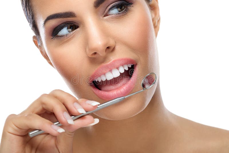 Woman with dental mirror stock photos Woman with dental mirror stock photos