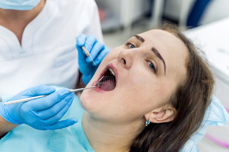 Woman in Dentistry Making Hygiene of Teeth Stock Image Image of mouth