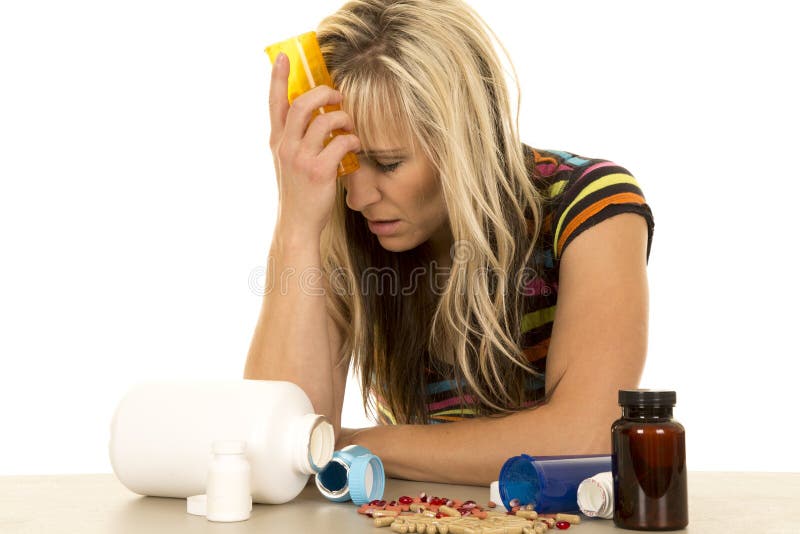 Woman depressed with lots of pills