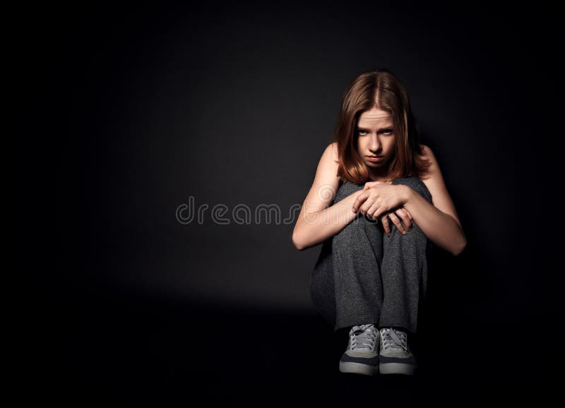 Woman in depression and despair crying on black dark royalty free stock photos Woman in depression and despair crying on black dark royalty free stock photos