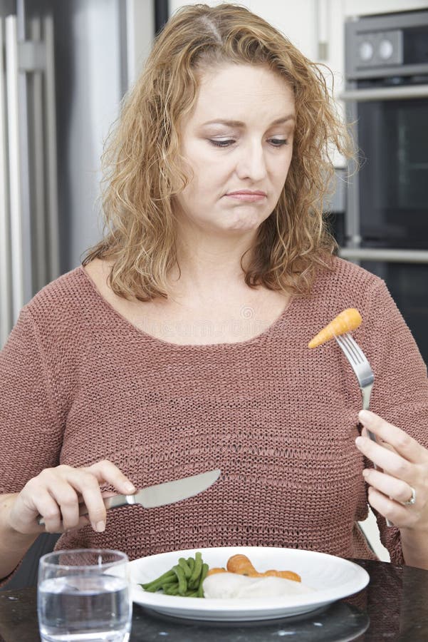 Fed Up Overweight Woman Eating Healthy Meal Kitchen Stock Photos - Free ...