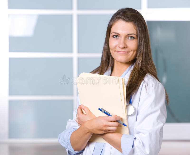 Woman doctor holding a chart