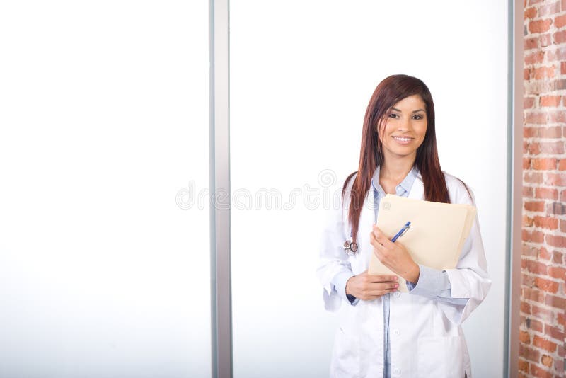 Woman doctor holding a chart