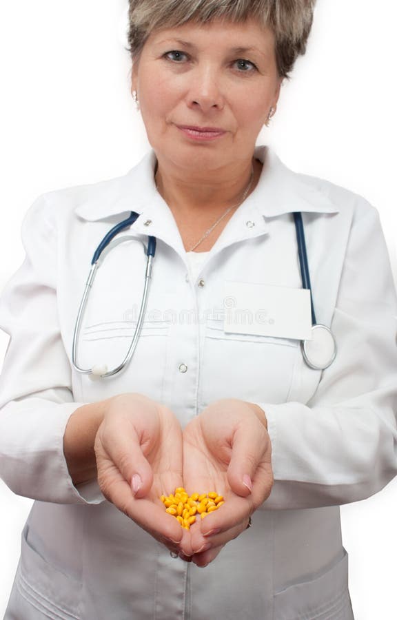 Woman doctor holding pills