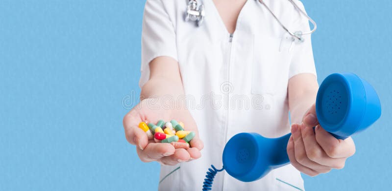 Woman doctor holding pills in one hand stock photos Woman doctor holding pills in one hand stock photos