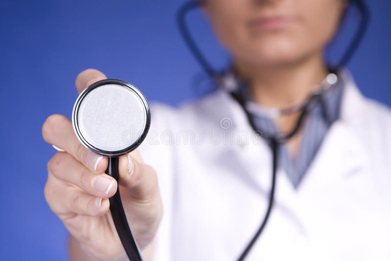 Woman doctor holding stethoscope. Nurse