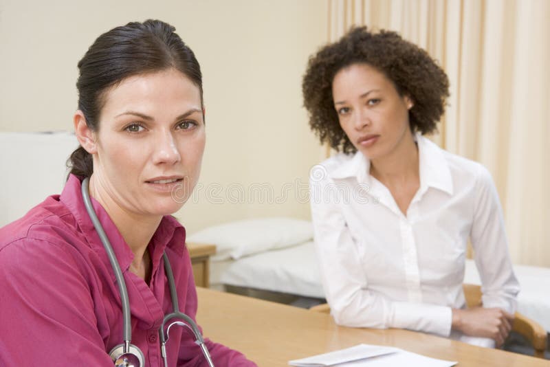 Medical Consultation Female Patient Discussing Doctor Stethescope