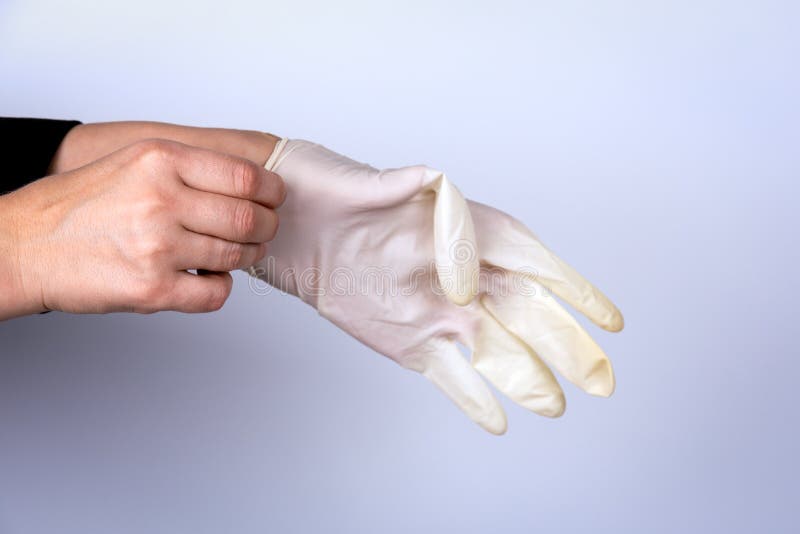 Woman doctor wears medical gloves stock image Woman doctor wears medical gloves stock image