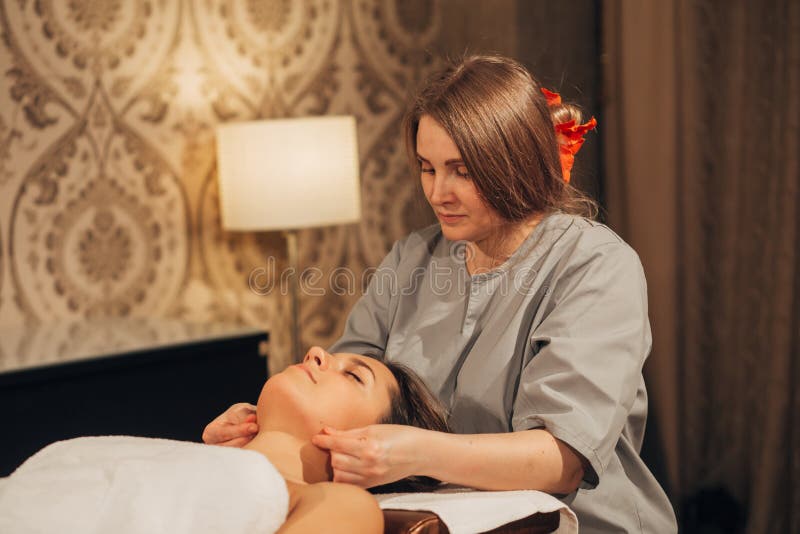 The Woman Doing The Facial Massage Stock Image Image Of Aesthetic Beauty 83482167