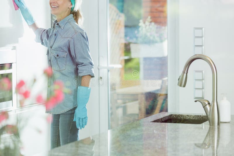 Woman doing house cleaning duties