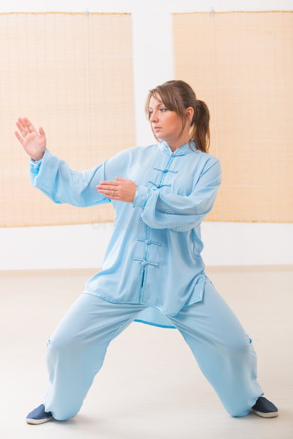 Woman Doing Qi Gong Tai Chi Exercise Stock Photo - Image of energy ...