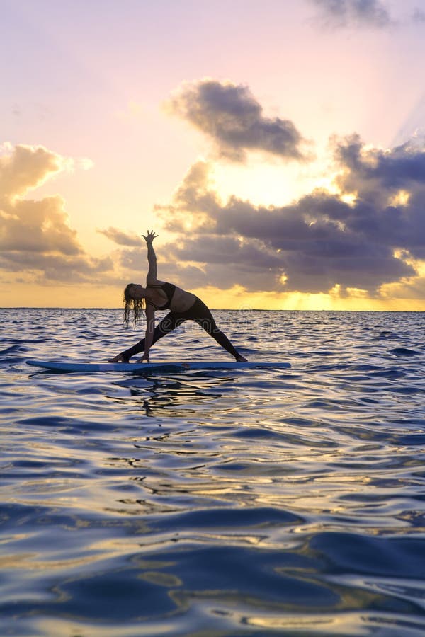 Sunrise Yoga on Paddle Board Stock Image - Image of exercise, female ...