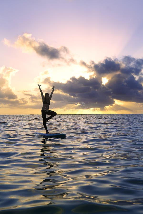 Sunrise Yoga On Paddle Board Stock Image - Image of fitness, ocean ...