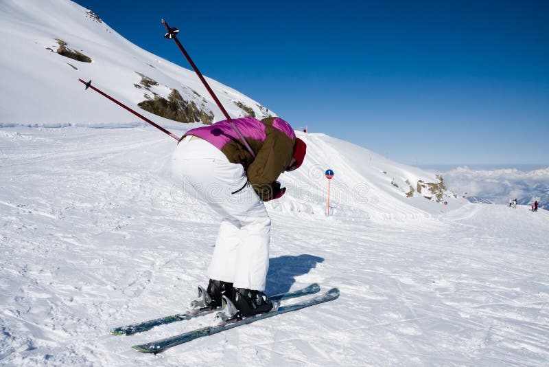 Woman downhill ski in apls