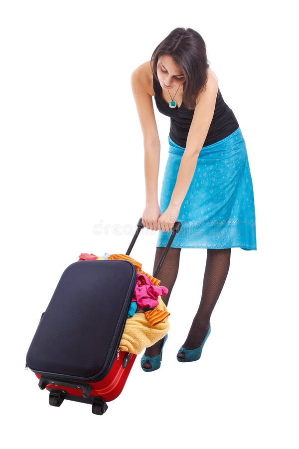 Woman dragging suitcase stock photo. Image of isolated 24078620