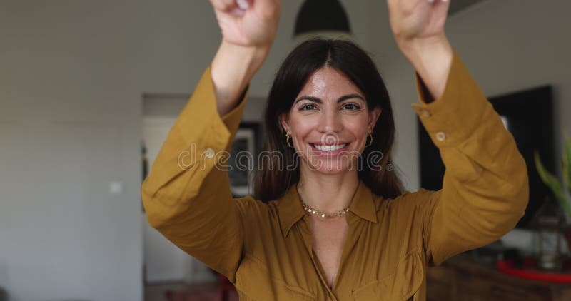 Woman drawing heart shape in air as symbol of love stock video