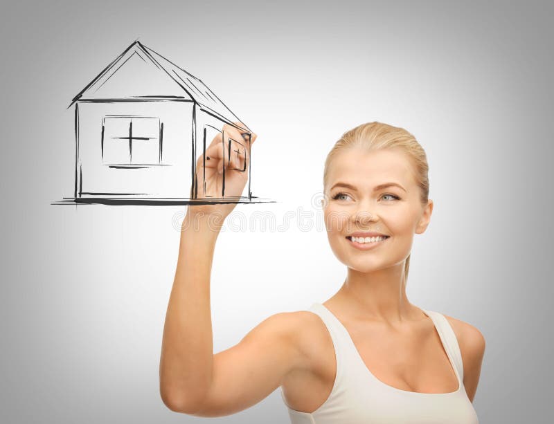 Woman drawing house on virtual screen