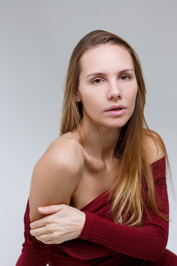 Woman in dress in studio stock photography