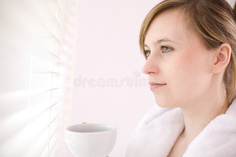 Woman drinking coffee stock photos