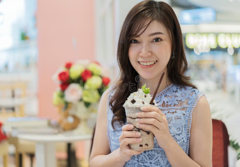 Woman Drinking a Cup of Chocolate Milk at Cafe Stock Image Image of