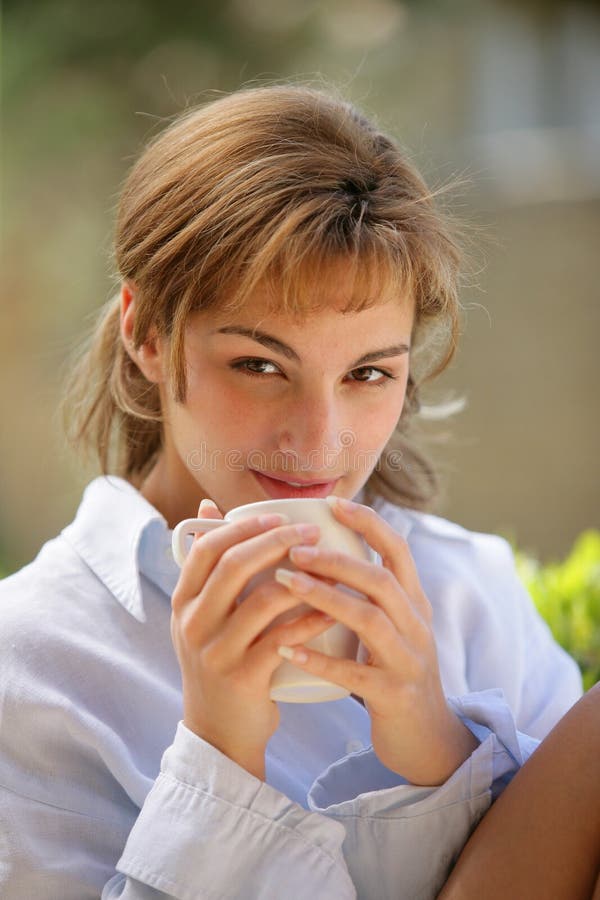 Woman Drinking a Cup of Coffee Stock Photo - Image of caucasian, warm