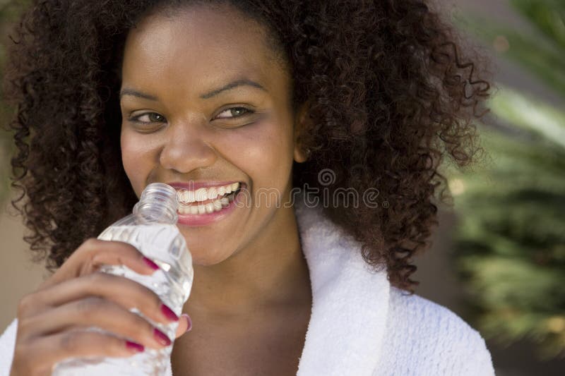 Woman Drinking Mineral Water royalty free stock photography