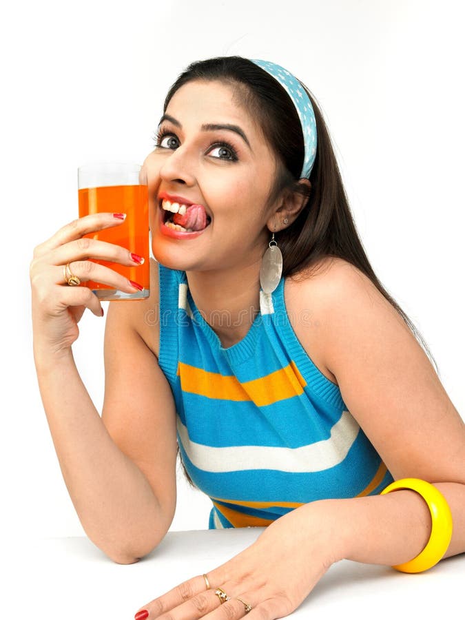 Woman drinking orange juice