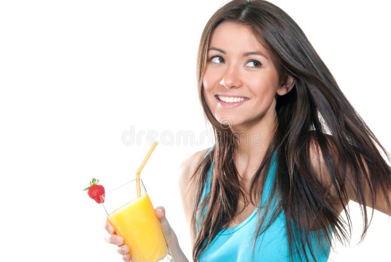 Woman drinking orange juice cocktail