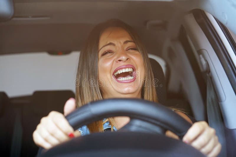 Woman Driving. Emotion. Screaming, Scared