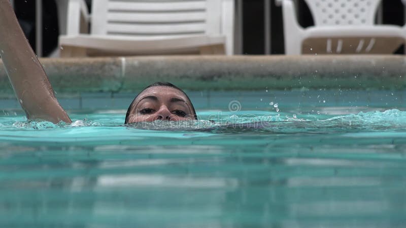 Woman Drowning in Swimming Pool