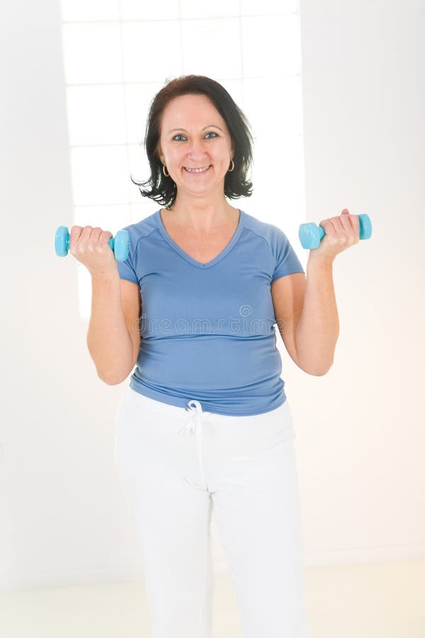 Woman with dumbbell