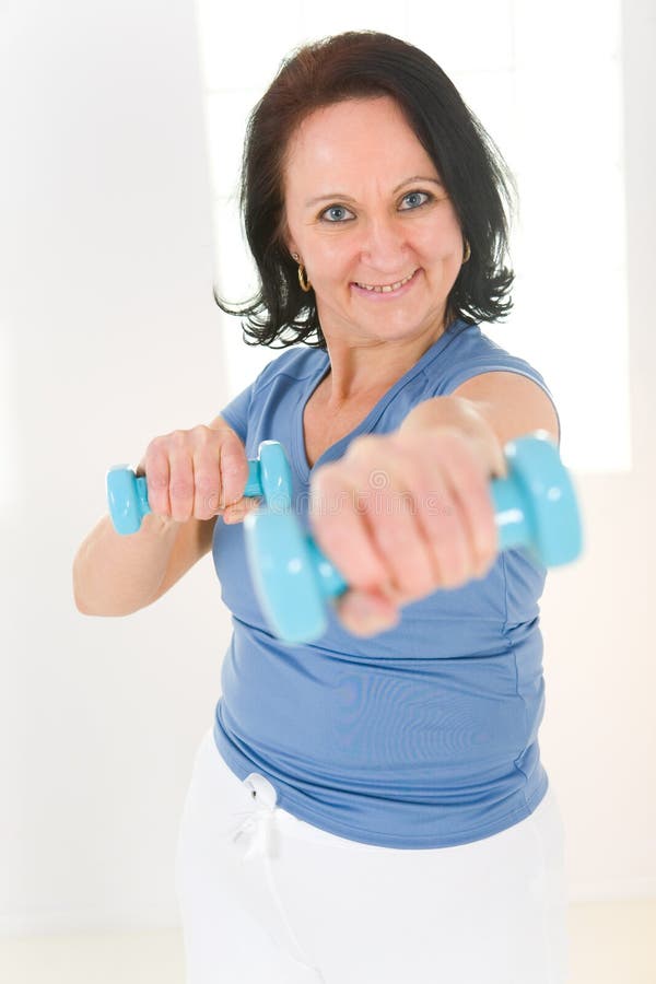 Woman with dumbbell